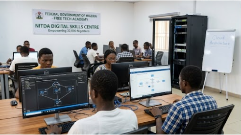 Students engaged in a learning environment at the NITDA Digital Skills Centre in Nigeria, focusing on technology and digital skills development.